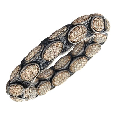 Lot 380 - Flexible Blackened Gold and Brown and Black Diamond Bangle Bracelet, by Roberto Demeglio