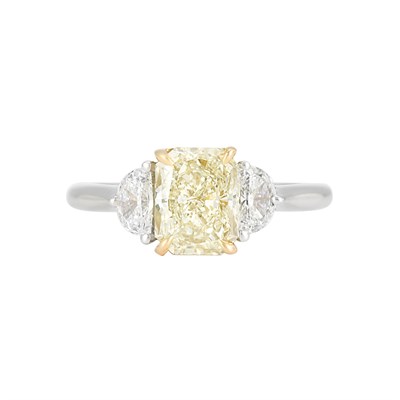 Lot 338 - Platinum, Gold, Light Yellow Diamond and Diamond Ring