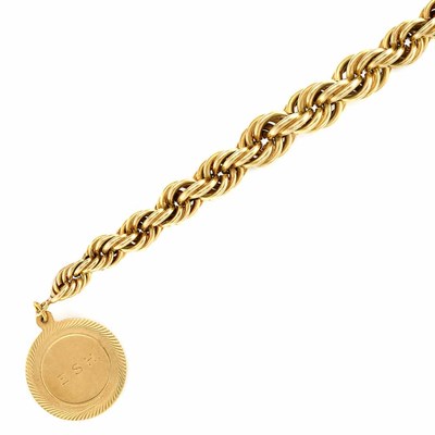 Lot 549 - Gold Charm, Yard, with Rope-Twist Gold Bracelet