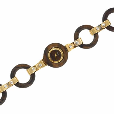 Lot 365 - Lady's Gold and Wood Bracelet-Watch, Gucci, France