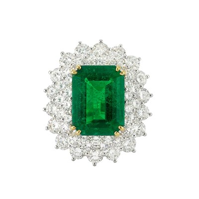 Lot 547 - Platinum, Gold, Emerald and Diamond Ring