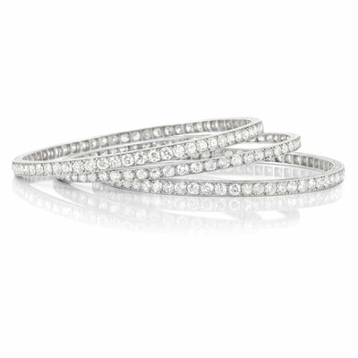 Lot 573 - Pair of Art Deco Platinum and Diamond Bangle Bracelets, Janesich, and Art Deco Platinum and Diamond Bangle Bracelet