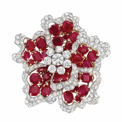 Lot 556 - Platinum, Gold, Diamond and Ruby Flower Clip-Brooch, David Webb