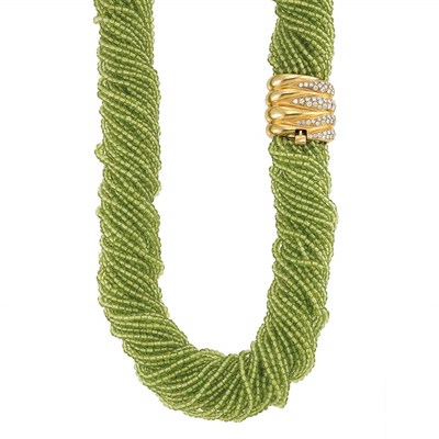 Lot 372 - Long Multistrand Peridot Bead Torsade Necklace with Gold and Diamond Clasp