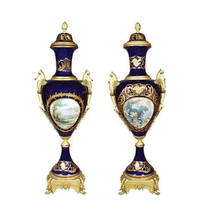 Lot 540 - Pair of Sevres Style Gilt-Metal Mounted and...