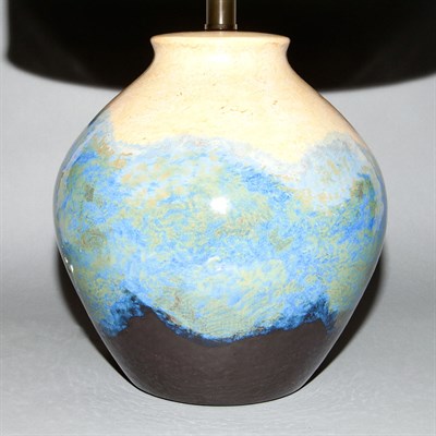 Lot 218 - Glazed Ceramic Lamp With a silk shade. Height...