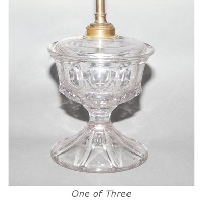 Lot 303 - Three Brass and Glass Oil Lamps
