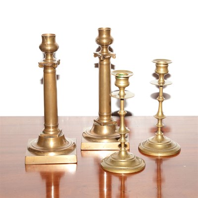 Lot 311 - Two Pairs of Brass Candlesticks Height 10 inches.