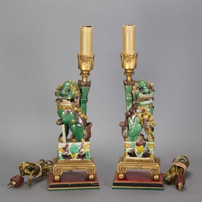 Lot 374 - Pair of Chinese Porcelain Sancai Glazed Foo...