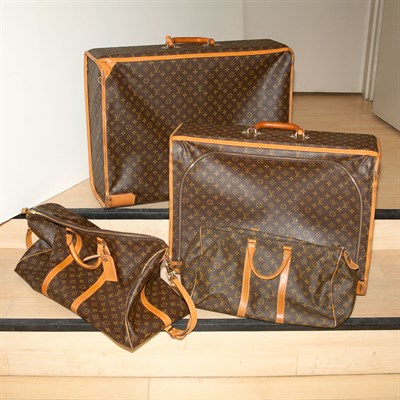 Lot 557 - Group of Four Louis Vuitton Soft Case Leather...