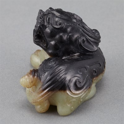Lot 97 - Chinese Black and Celadon Jade Qilin The...