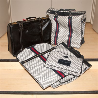 Lot 558 - Group of Four Gucci Soft Case Fabric Suitcases;...