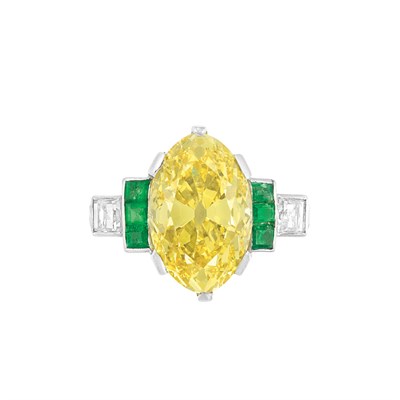 Lot 430 - Platinum, Fancy Vivid Yellow Diamond, Emerald and Diamond Ring