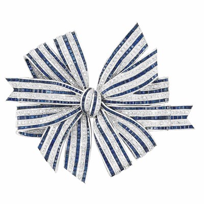 Lot 234 - White Gold, Diamond and Sapphire Bow Clip-Brooch