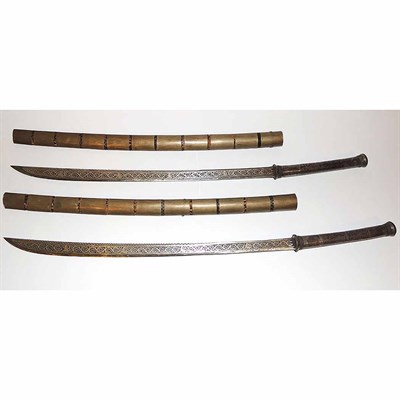 Lot 511 - Pair of Asian Incised Metal Swords with...