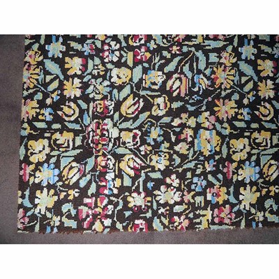 Lot 529 - Wool Carpet 20th Century With a floral motif...