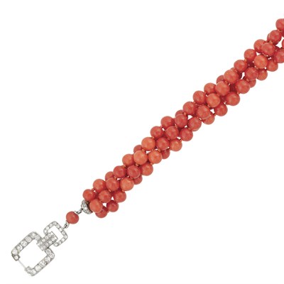 Lot 177 - Art Deco Four Strand Coral Bead, Platinum and Diamond Torsade Bracelet