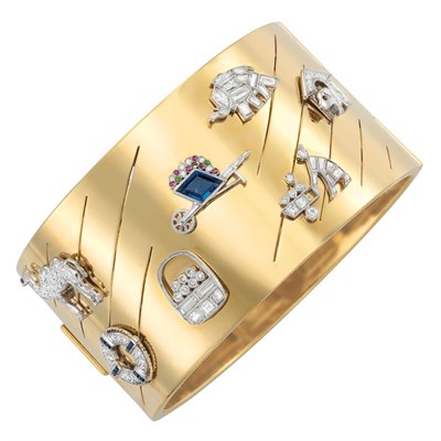 Lot 202 - Gold, Platinum, Diamond and Gem-Set Charm Cuff Bangle Bracelet