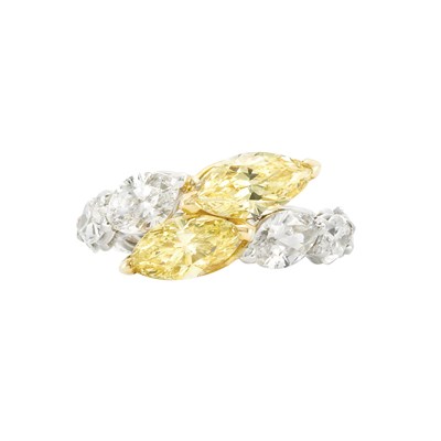 Lot 80 - Platinum, Light Yellow Diamond and Diamond Band Ring