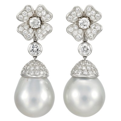 Lot 248 - Pair of Platinum, Diamond and South Sea Cultured Pearl Pendant-Earclips, by Marvin Schluger