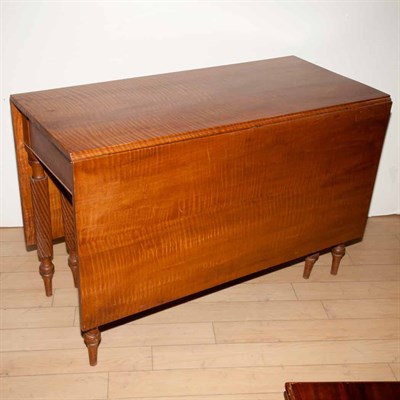 Lot 223 - American Classical Fruitwood Drop-Leaf Table...
