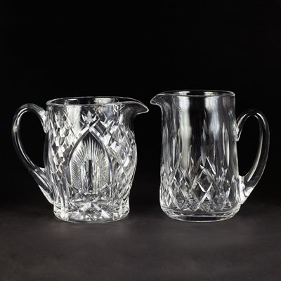 Lot 653 - Two Waterford Cut Glass Pitchers Height of...