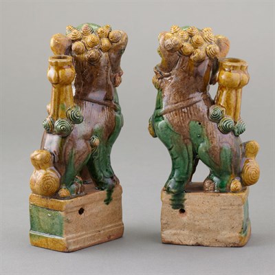 Lot 83 - Pair of Chinese Sancai Glazed Pottery Foo Lion...