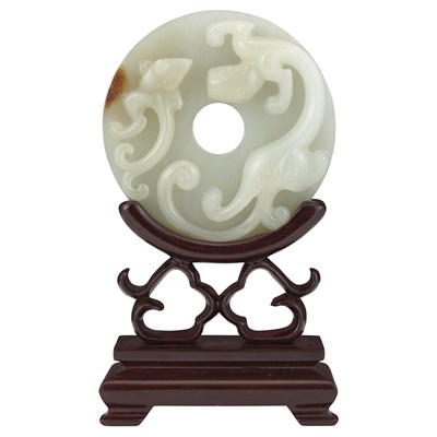 Lot 70 - Chinese White Jade Bi 19th Century The thickly...